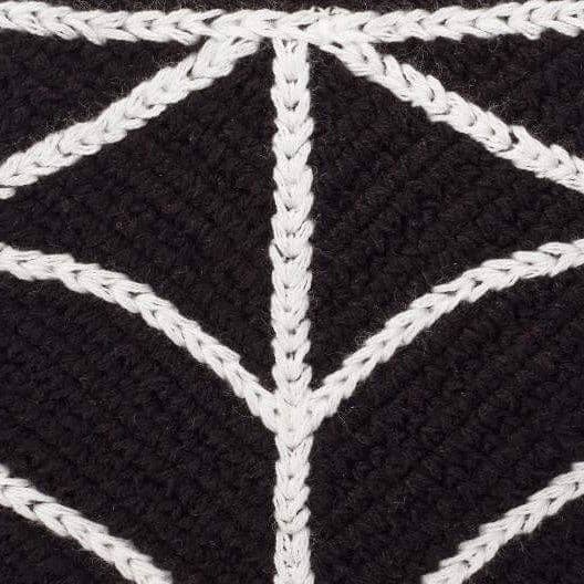 Close-up of the central white spiderweb stitching and black crochet texture on The Foggy Dog Spiderweb bandana