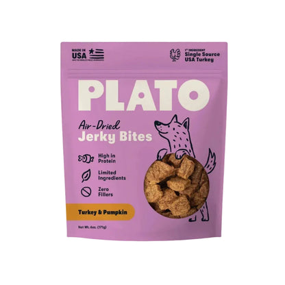 Plato Turkey with Pumpkin Air-Dried Jerky Bites dog treats, purple 6 oz bag on a plain white background.