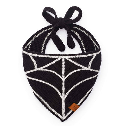 The Foggy Dog Spiderweb Crochet dog bandana in black with a white stitched spiderweb pattern and tie straps