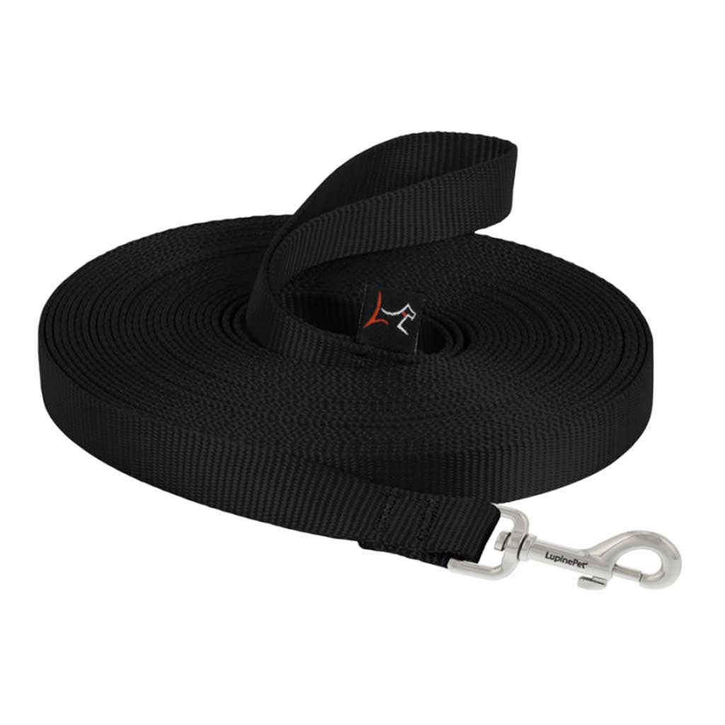 Black Lupine Pet long-line training leash coiled on a white background, showing its loop handle and metal snap.