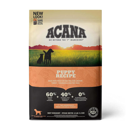 Front of a 13 lb bag of ACANA Puppy & Junior Recipe dry dog food.