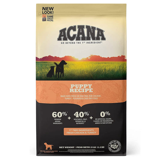 Front of ACANA Puppy & Junior Recipe dry dog food bag with an orange label.