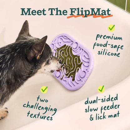 Dog licking from Flipmat Mini attached to inside of bathtub. Meet the FlipMat. premium food-safe silicone. two challenging textures. dual-sided slow feeder and lick mat