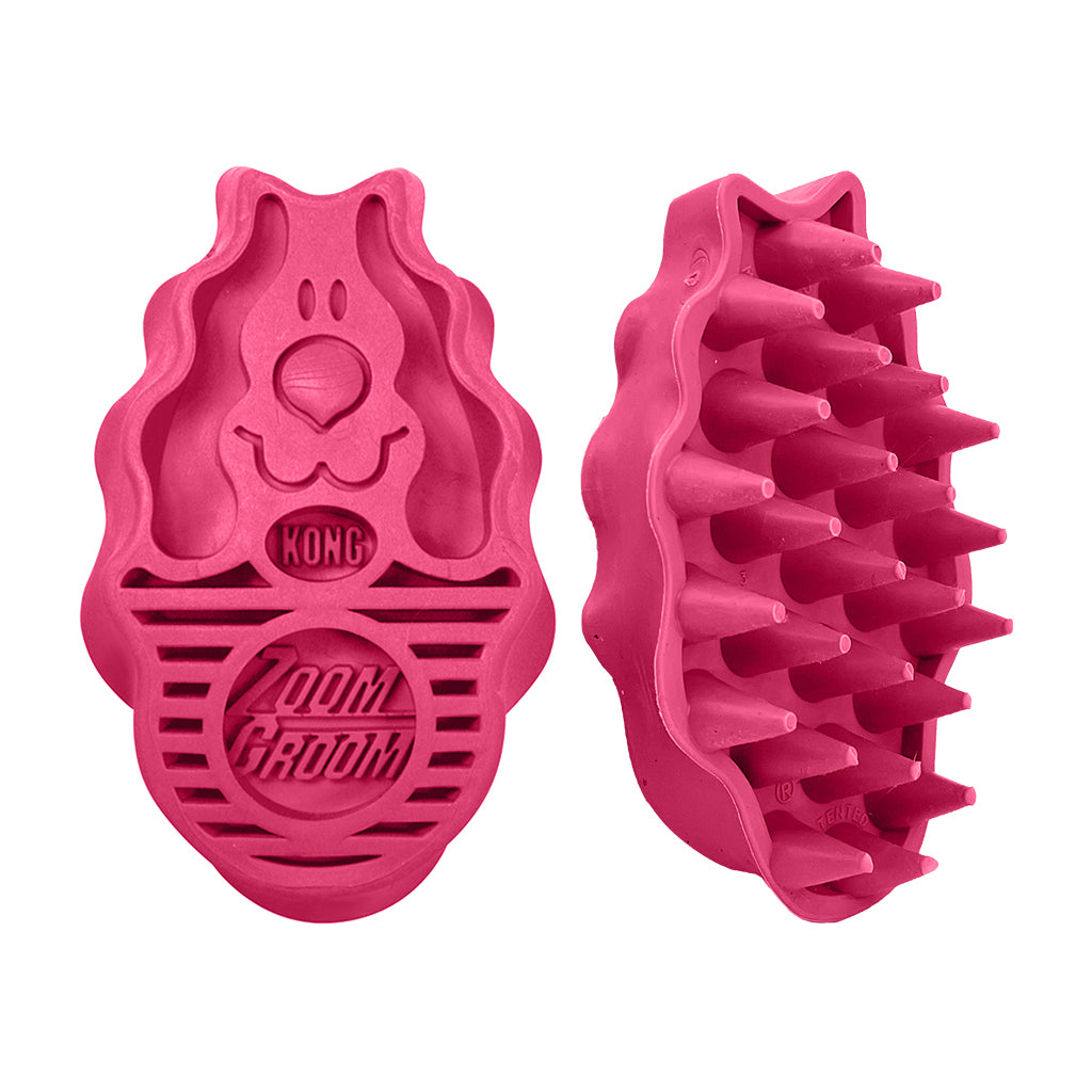 Pink KONG ZoomGroom grooming brush shown from the back and bristle side.