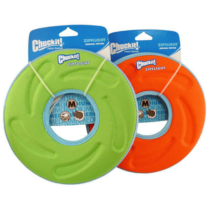 Green and orange Chuckit! Zipflight medium flying discs with blue rims and center openings on retail packaging.