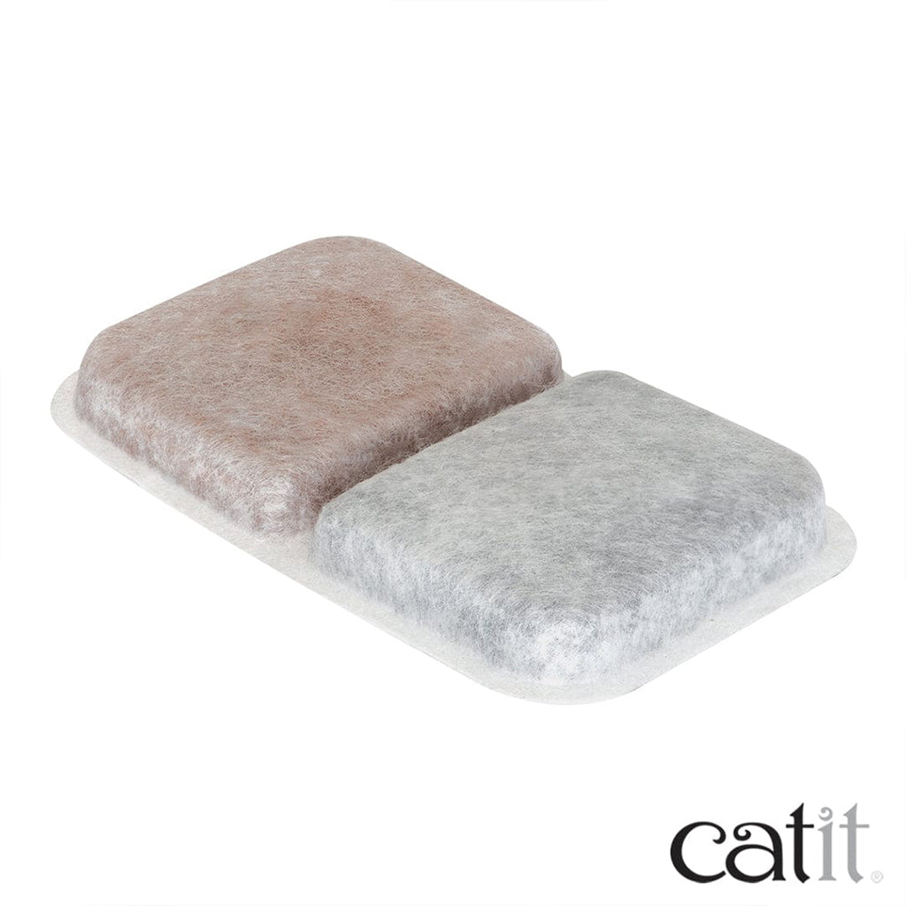 Close-up of a Catit Airsift litter box filter pad with adjoining beige and gray filter sections on a white backing.