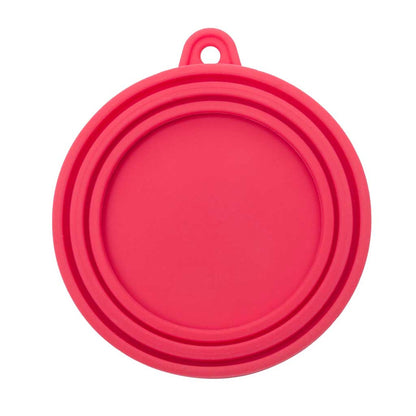 Underside of the pink Messy Mutts silicone can cover showing three concentric sealing rings.