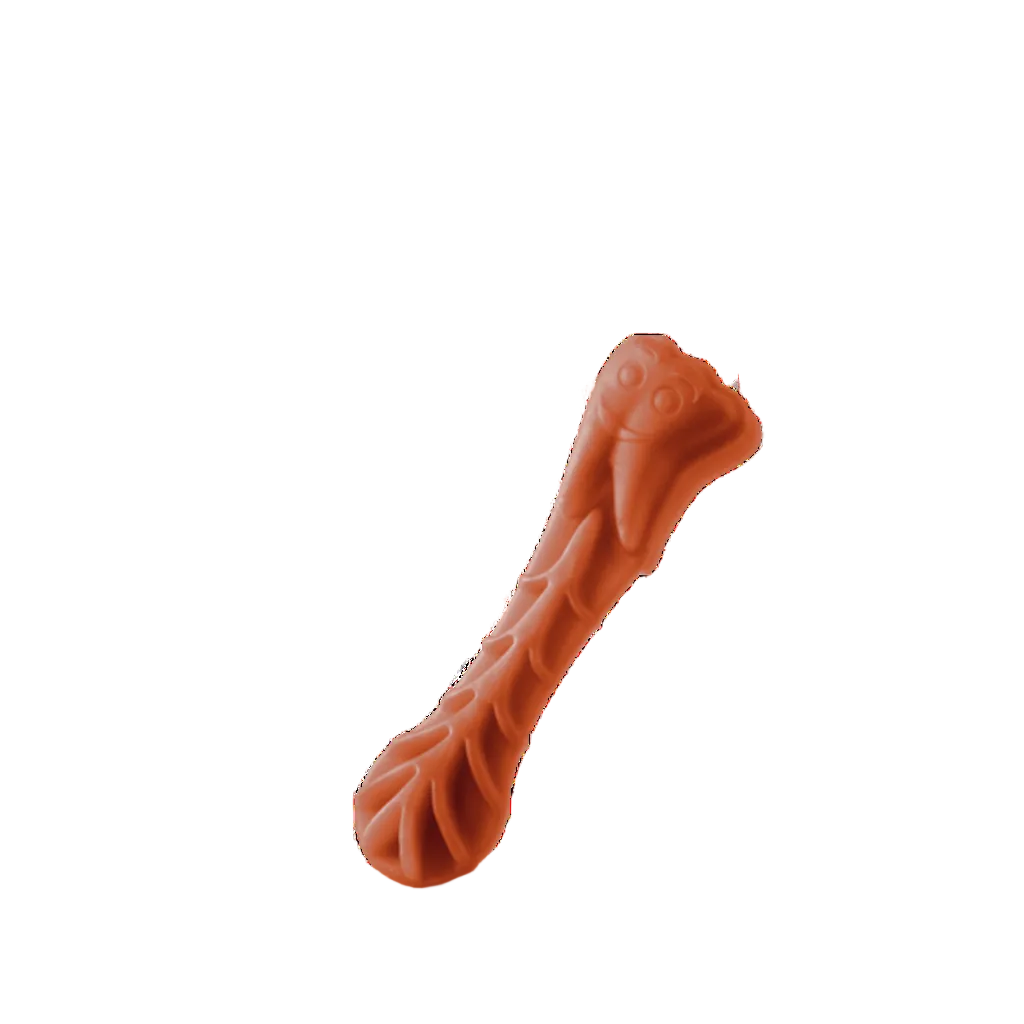 An orange-brown denta ldog chew shaped like a toothbrush, shown on a clean white background with a soft shadow.