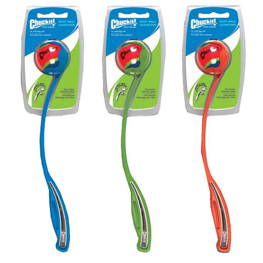 Three packaged Chuckit! Mini Sport Ball Launchers in blue, green, and red, with ergonomic grips and included mini tennis balls.