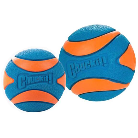 Two blue and orange Chuckit! Ultra Squeaker rubber dog balls in different sizes, with textured surfaces and raised Chuckit! logos.