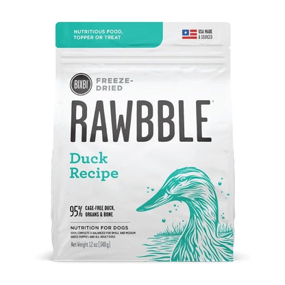 Front of a 12 oz bag of BIXBI RAWBBLE Duck Recipe freeze-dried dog food, with teal lettering and a duck illustration.