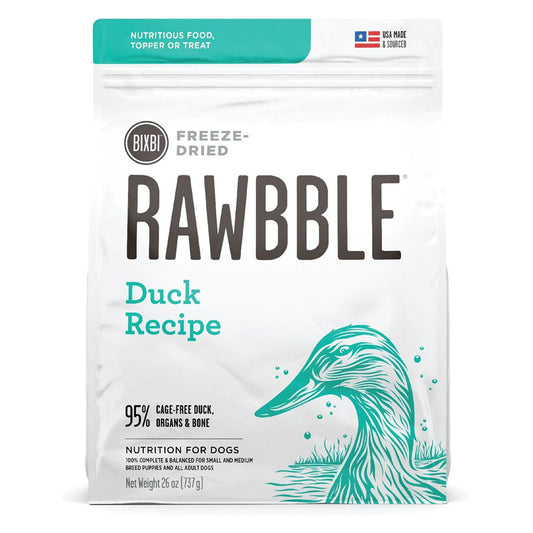 Front of a 26 oz bag of BIXBI RAWBBLE Duck Recipe freeze-dried dog food, with teal lettering and a duck illustration.