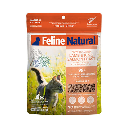 Front of a Feline Natural Lamb & King Salmon Feast freeze-dried cat food pouch, with an orange top and cat illustration.