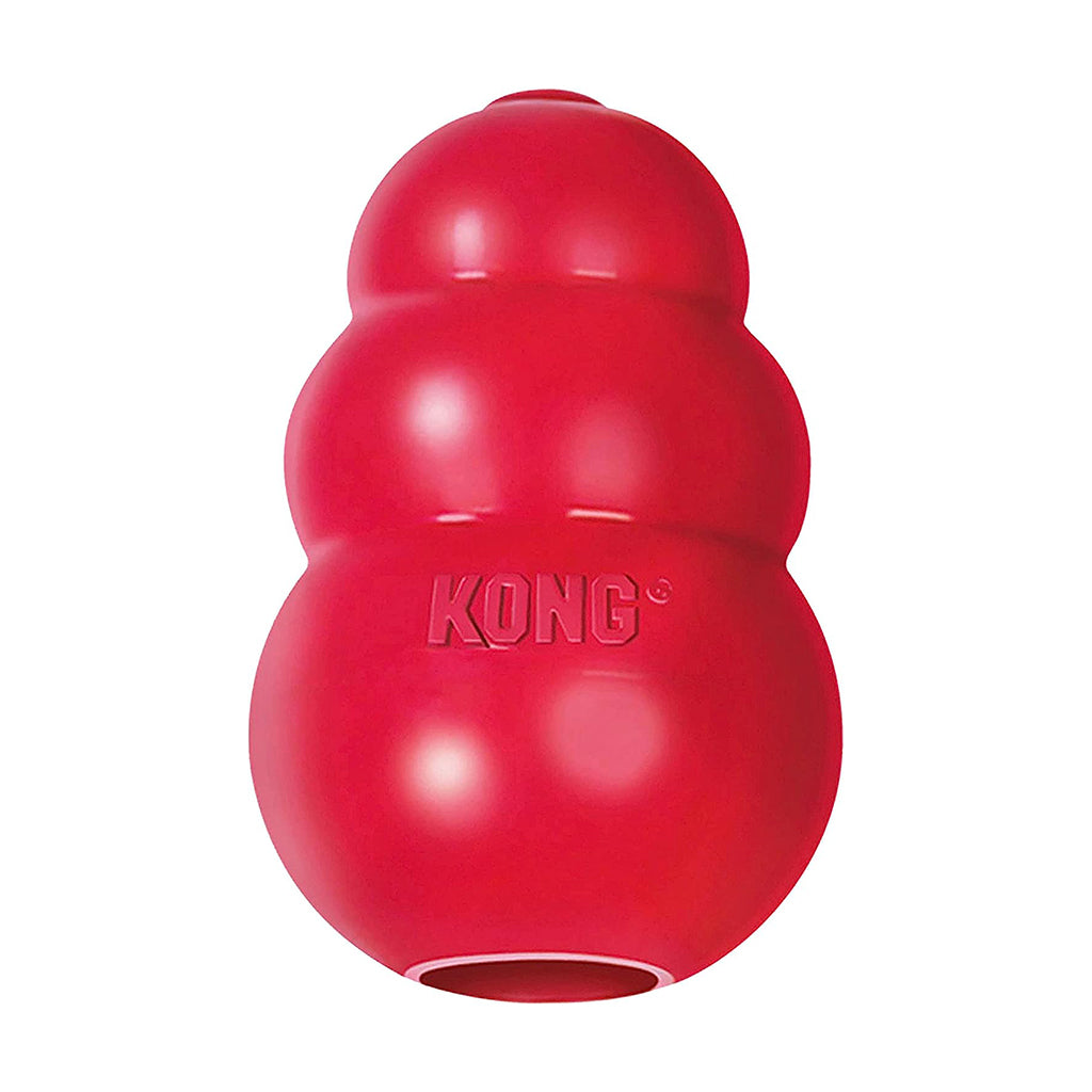 Red KONG Classic rubber dog toy with three rounded tiers and a hollow treat opening.
