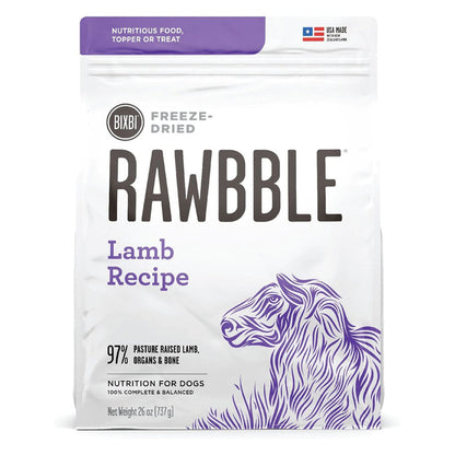 Front of a 26 oz bag of BIXBI RAWBBLE Lamb Recipe freeze-dried dog food, with purple lettering and a sheep illustration.