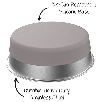 Upside-down Messy Mutts stainless steel bowl with arrows identifying the removable gray silicone base and steel rim.