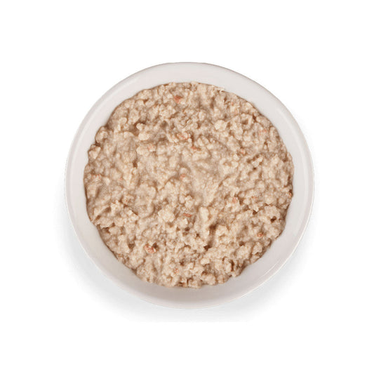 Baby Chicken, Tuna & Chicken Liver Pate Grain-Free Wet Kitten Food 2.4oz in a bowl