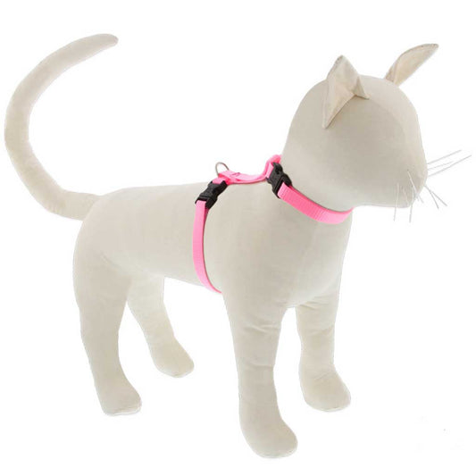 White cat mannequin wearing a pink Lupine Pet H-style harness, showing the neck and girth straps.