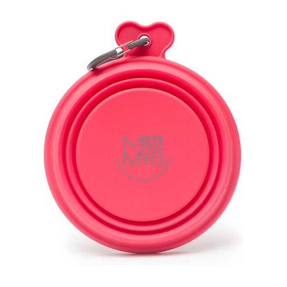 Watermelon red Messy Mutts silicone travel bowl folded flat, showing its logo and attached gray carabiner.