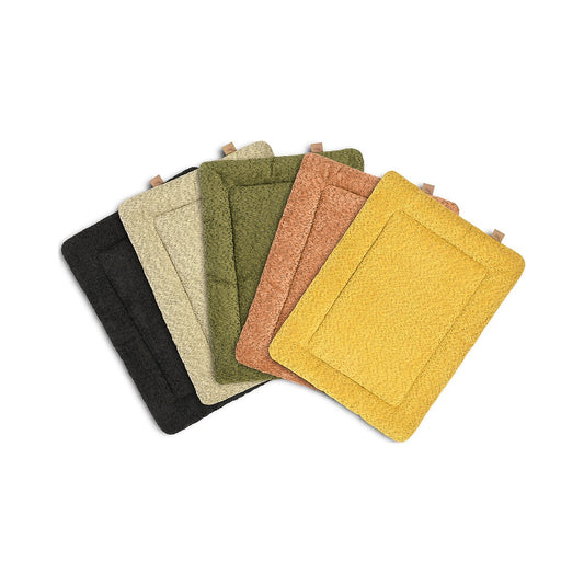 Five P.L.A.Y. Canyon Chill Pads arranged in a fan in black, light beige, green, terracotta, and yellow.
