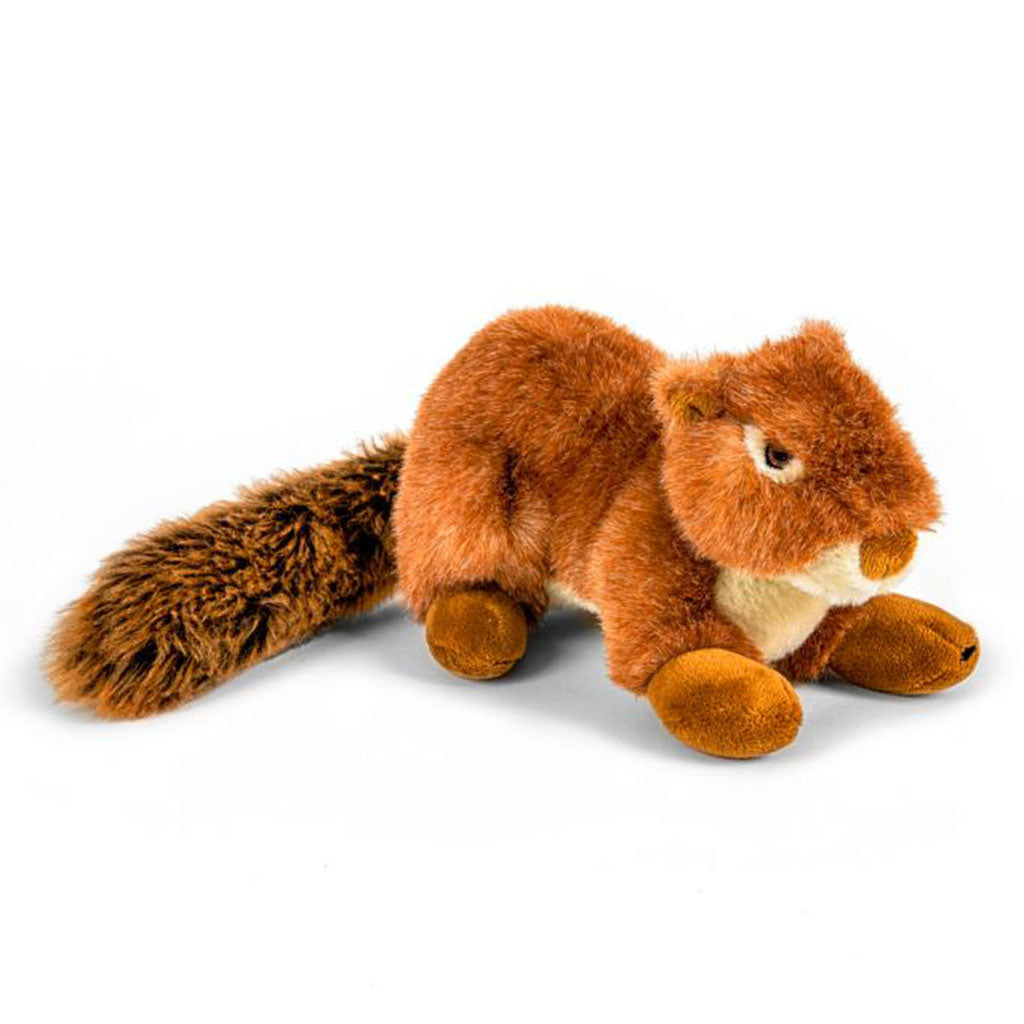 Side view of Fluff & Tuff Red Squirrel Squeakerless plush dog toy crouching with its bushy tail stretched behind it.