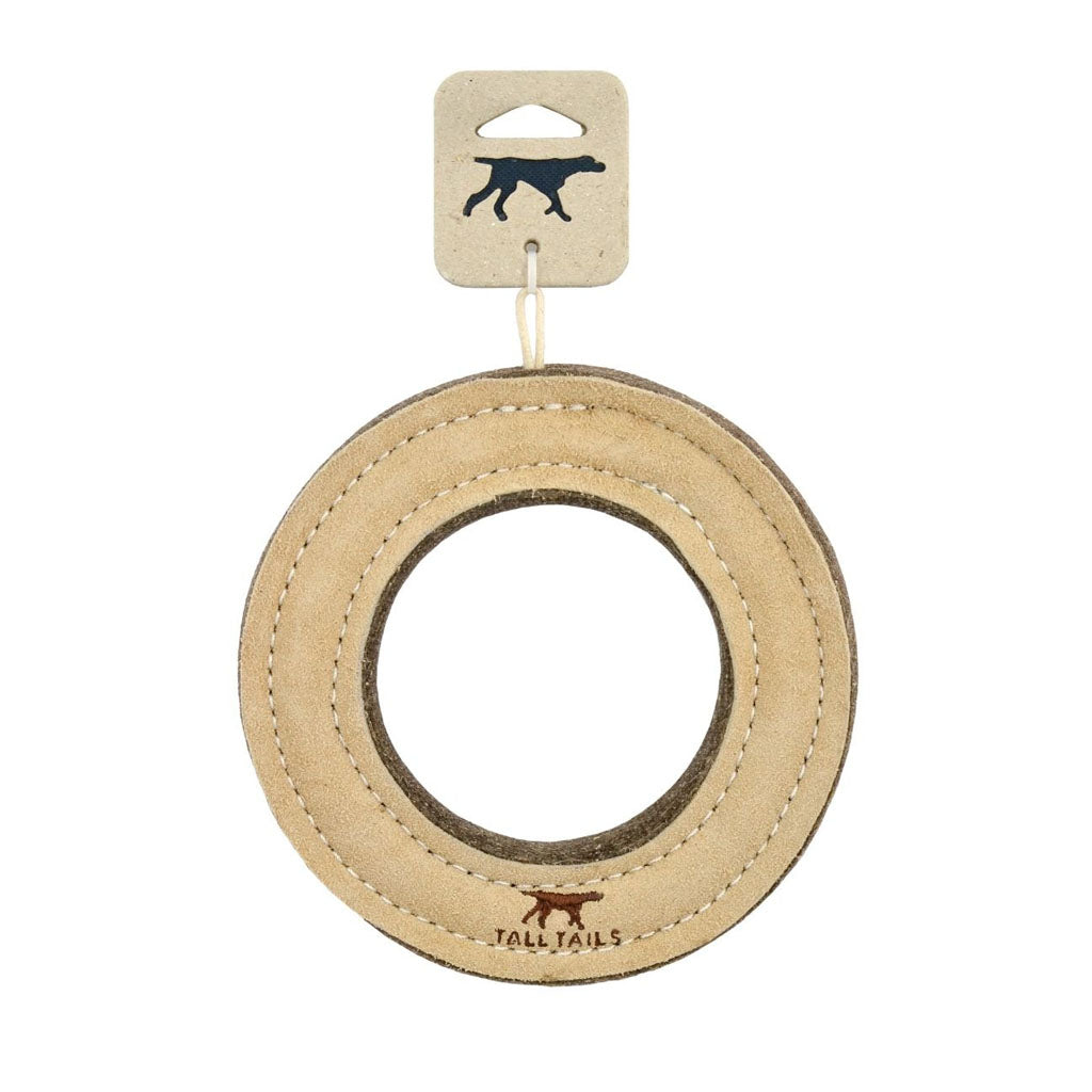 Tan Tall Tails Natural Leather & Wool Ring dog toy attached to a cardboard hang tag with a dog silhouette