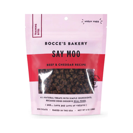 Front of a 6 oz pink pouch of Bocce’s Bakery Say Moo Beef & Cheddar training bites for dogs, with small treats visible through the window.