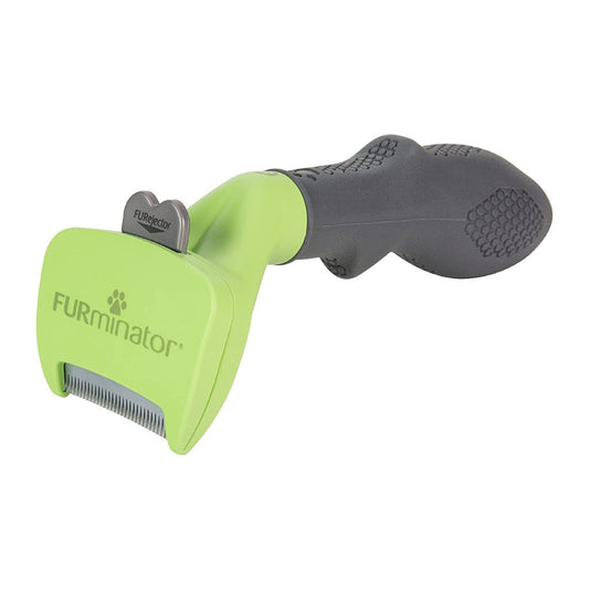 Green FURminator dog deShedding tool with a stainless steel edge, gray handle and FURejector button