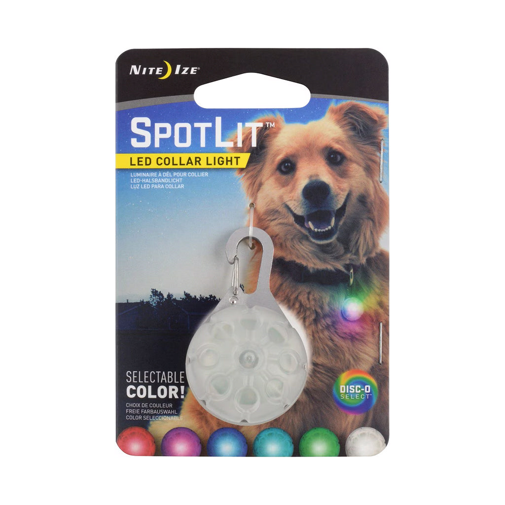 Nite Ize SpotLit Disc-O Select LED collar light in retail packaging, showing the round light, metal carabiner clip, and six selectable colors.