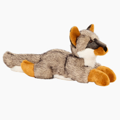 Side view of Fluff & Tuff Sterling Fox plush dog toy showing its long gray tail, white chest, and orange paws.