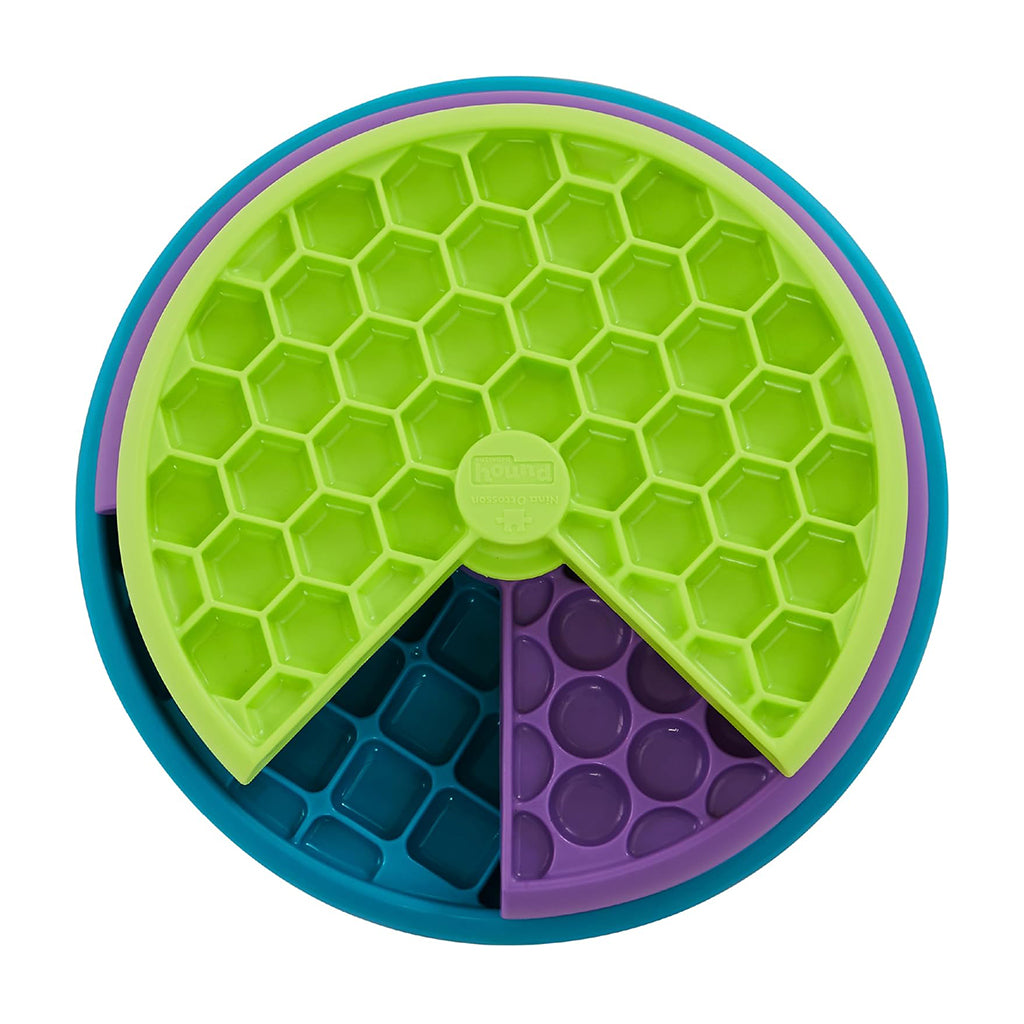 Nina Ottosson by Outward Hound Lickin’ Layers dog puzzle with three rotating green, purple, and blue trays containing textured treat compartments.