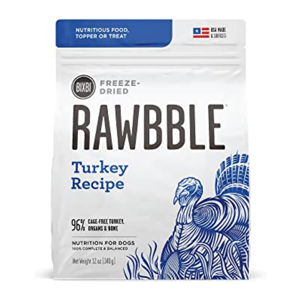 Front of a 12 oz bag of BIXBI RAWBBLE Turkey Recipe freeze-dried dog food, with blue-purple lettering and a turkey illustration.