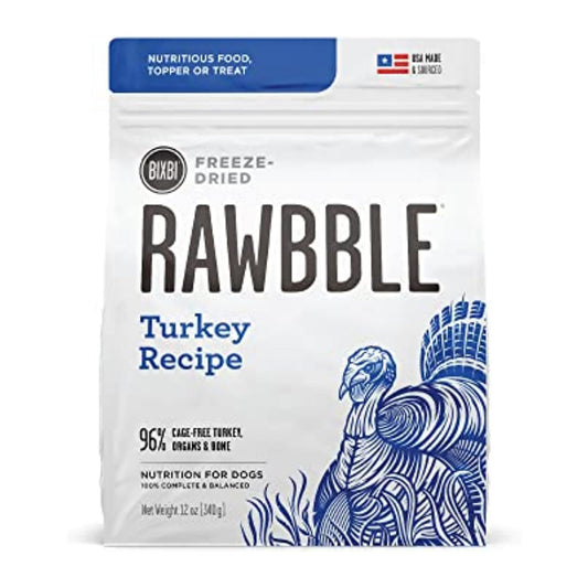 Front of a 12 oz bag of BIXBI RAWBBLE Turkey Recipe freeze-dried dog food, with blue-purple lettering and a turkey illustration.