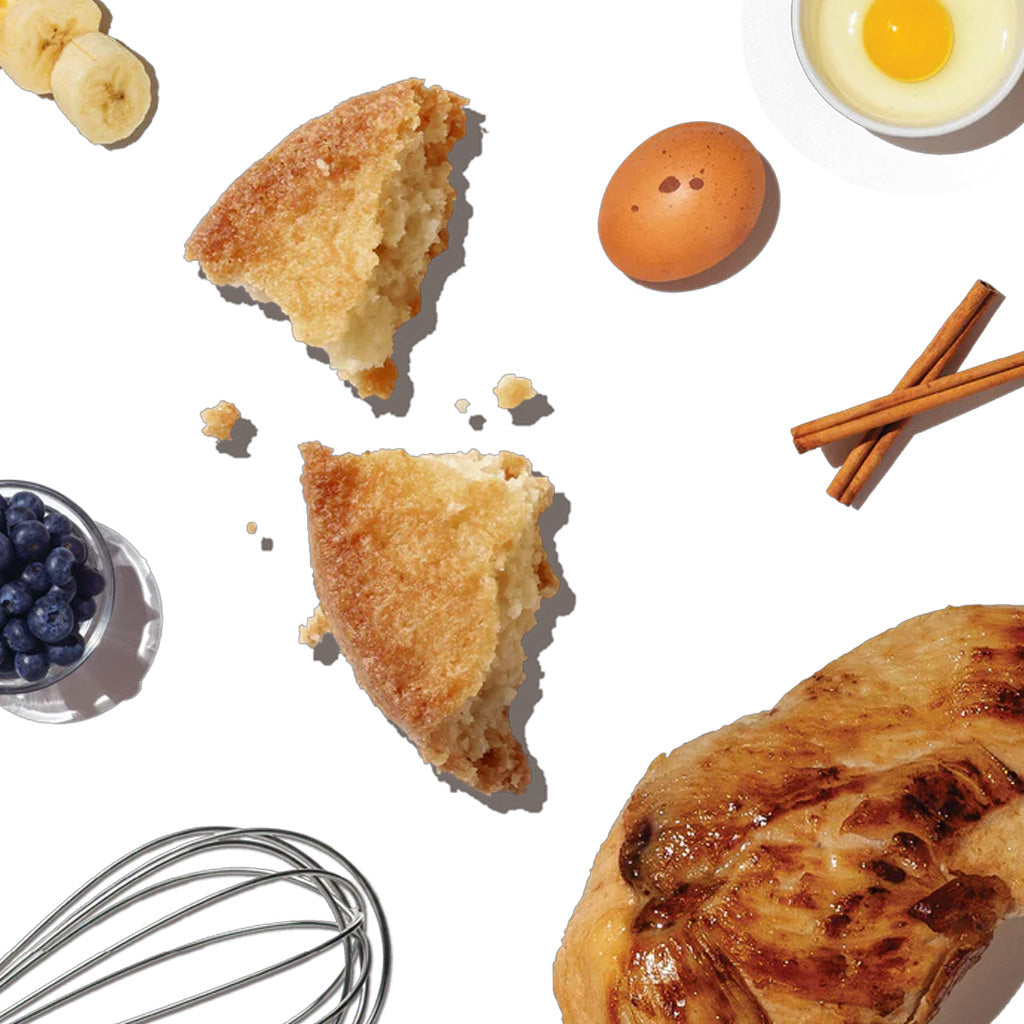 Photo of ingredients in birthday cake mix including eggs, Blueberries, Banana chicken and cinnamon