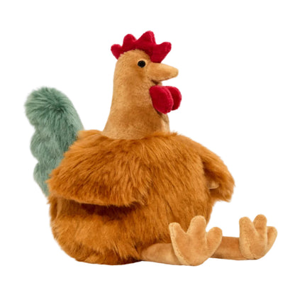 Photo of a brown, green and red chicken plush toy on a white background.