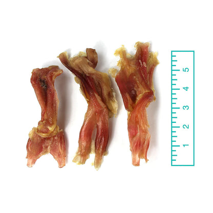 Assorted Beef Tendons 8oz compared to a ruler.