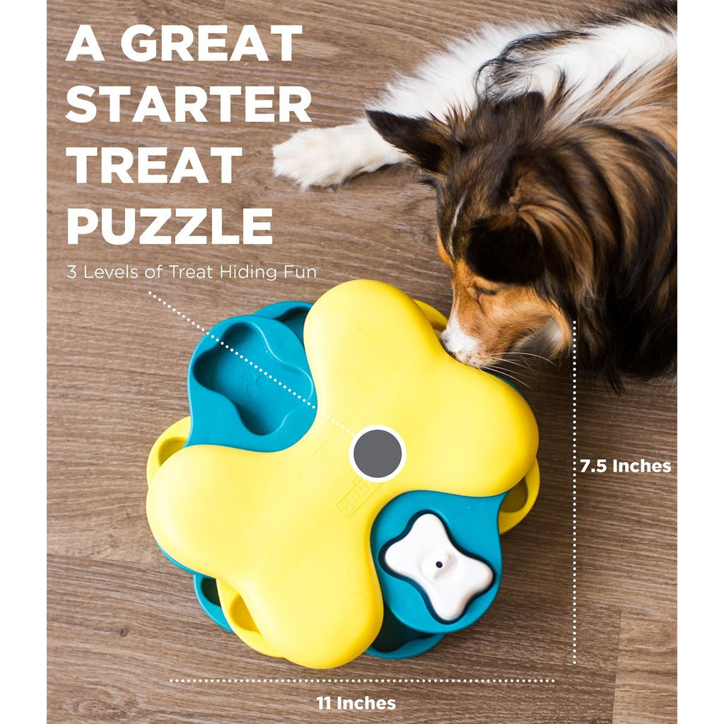 Tricolor dog sniffing the yellow and blue Dog Tornado puzzle; size guide shows 11 by 7.5 inches and three treat-hiding layers.