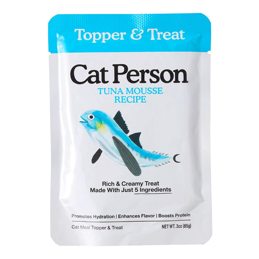 Front of a blue and white 3 oz Cat Person Tuna Mousse Recipe cat meal topper and treat pouch, with a tuna illustration.