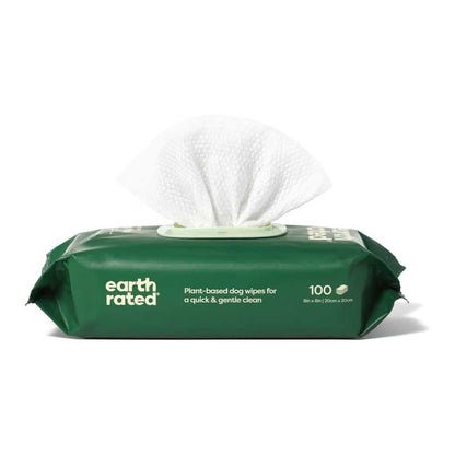 Earth Rated unscented plant-based dog wipes, 100-count green resealable pack with a white wipe pulled out